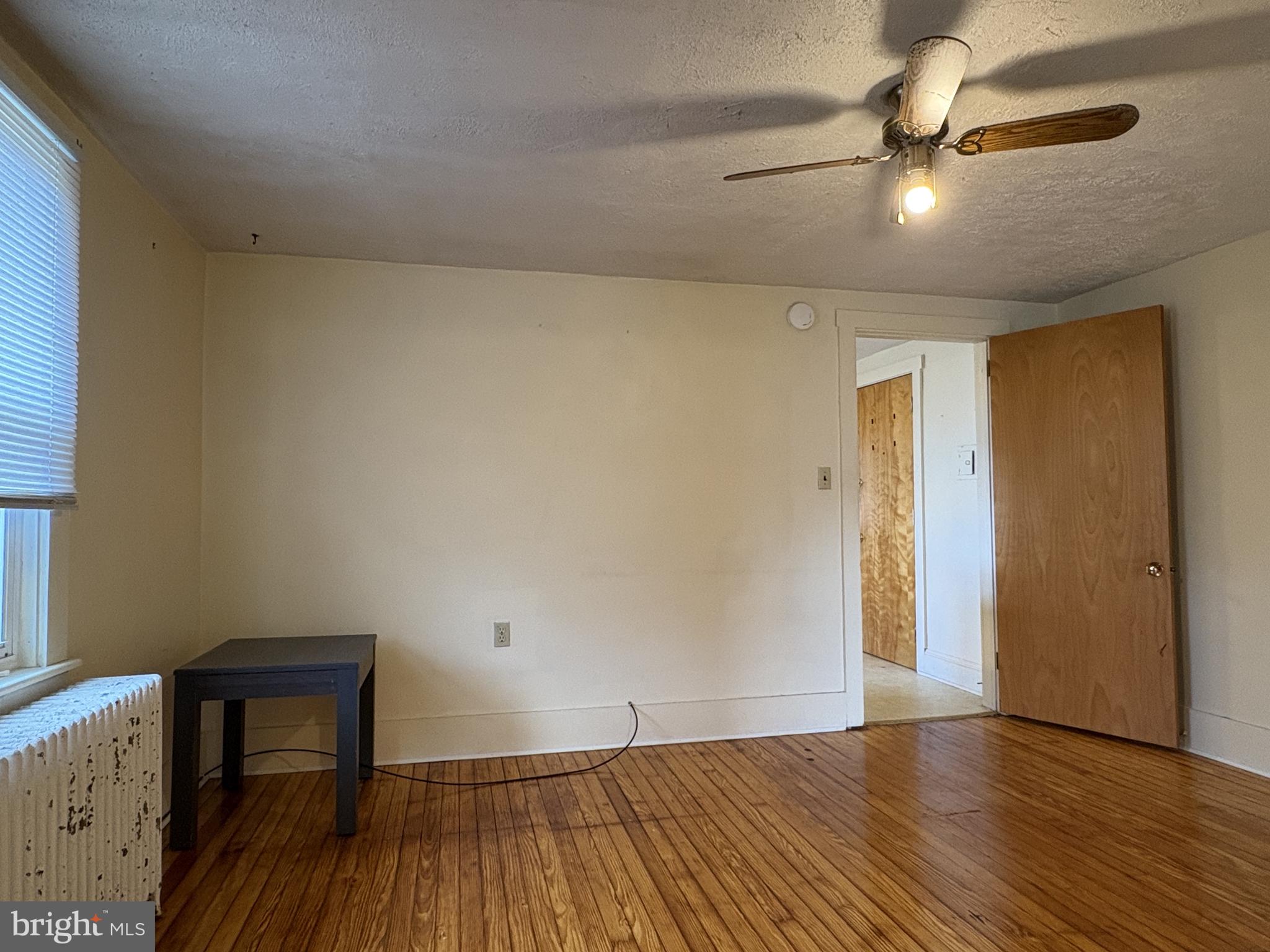 119 Maffitt Street, Unit 4 Elkton, MD 21921 - Photo 8 of 17 a view of empty room with wooden floor