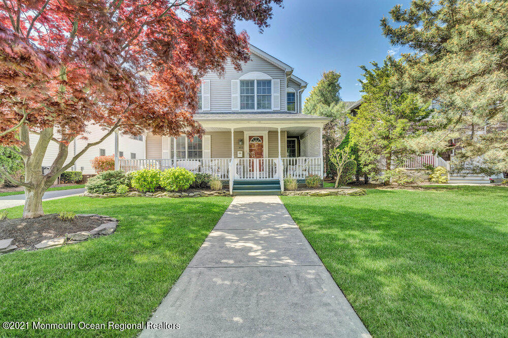 303 Salem Avenue Spring Lake, NJ 07762 - Photo 3 of 38 a front view of house with yard and green space