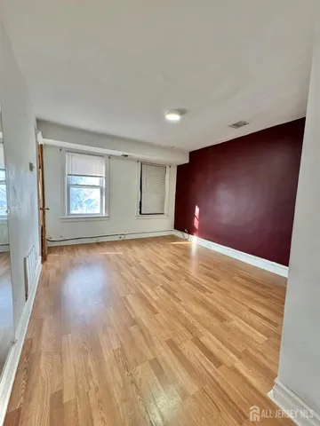 a bathroom with a bathtub and a sink