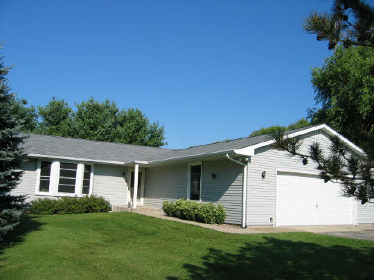 13795 Cook Road Pecatonica, IL 61063 - Photo 1 of 11 front view of a house with a yard