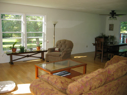 13795 Cook Road Pecatonica, IL 61063 - Photo 2 of 11 a living room with furniture and a window