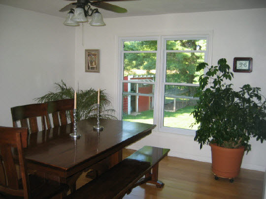 13795 Cook Road Pecatonica, IL 61063 - Photo 4 of 11 a view of a dining room with furniture window and outside view