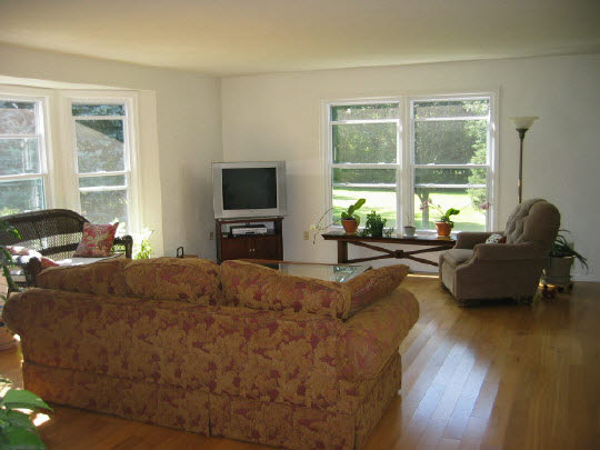 13795 Cook Road Pecatonica, IL 61063 - Photo 5 of 11 a living room with furniture window and a flat screen tv