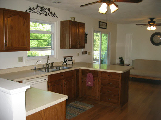 13795 Cook Road Pecatonica, IL 61063 - Photo 6 of 11 a kitchen with a sink cabinets and window