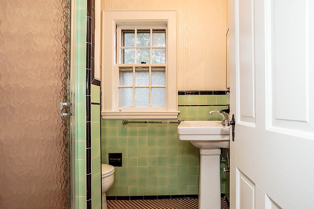 79 Douglas Road Belmont, MA 02478 - Photo 11 of 17 a bathroom with a sink and mirror