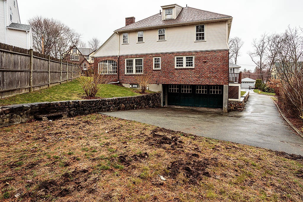 79 Douglas Road Belmont, MA 02478 - Photo 17 of 17 a front view of a house with a yard