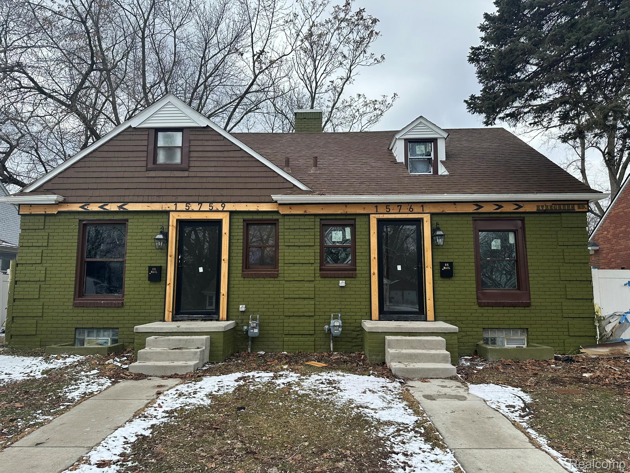 15759 Evergreen Road Detroit, MI 48223 - Photo 2 of 25 Bungalow-style house with a chimney and entry steps