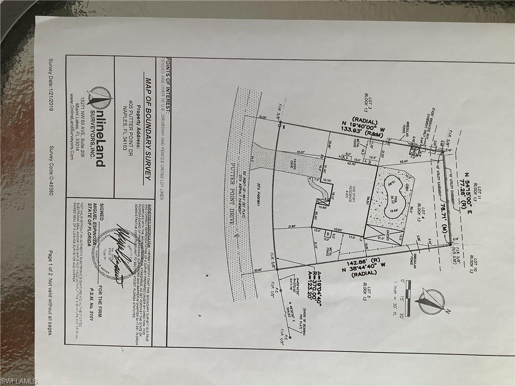 405 Putter Point Drive Naples, FL 34103 - Photo 3 of 3 a view of a kitchen with white wall