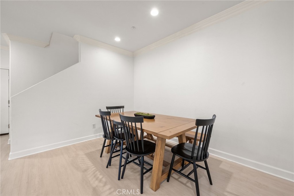 6 Lynde Street Ladera Ranch, CA 92694 - Photo 16 of 35 a view of a dining room with furniture and wooden floor