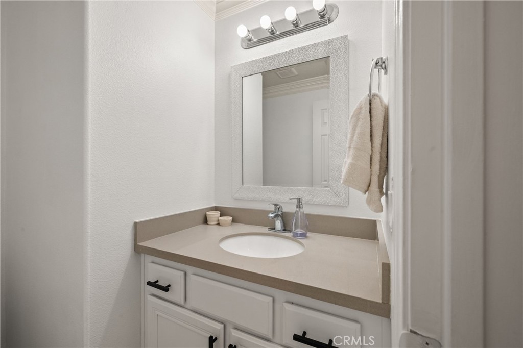 6 Lynde Street Ladera Ranch, CA 92694 - Photo 33 of 35 a bathroom with a sink vanity and a mirror