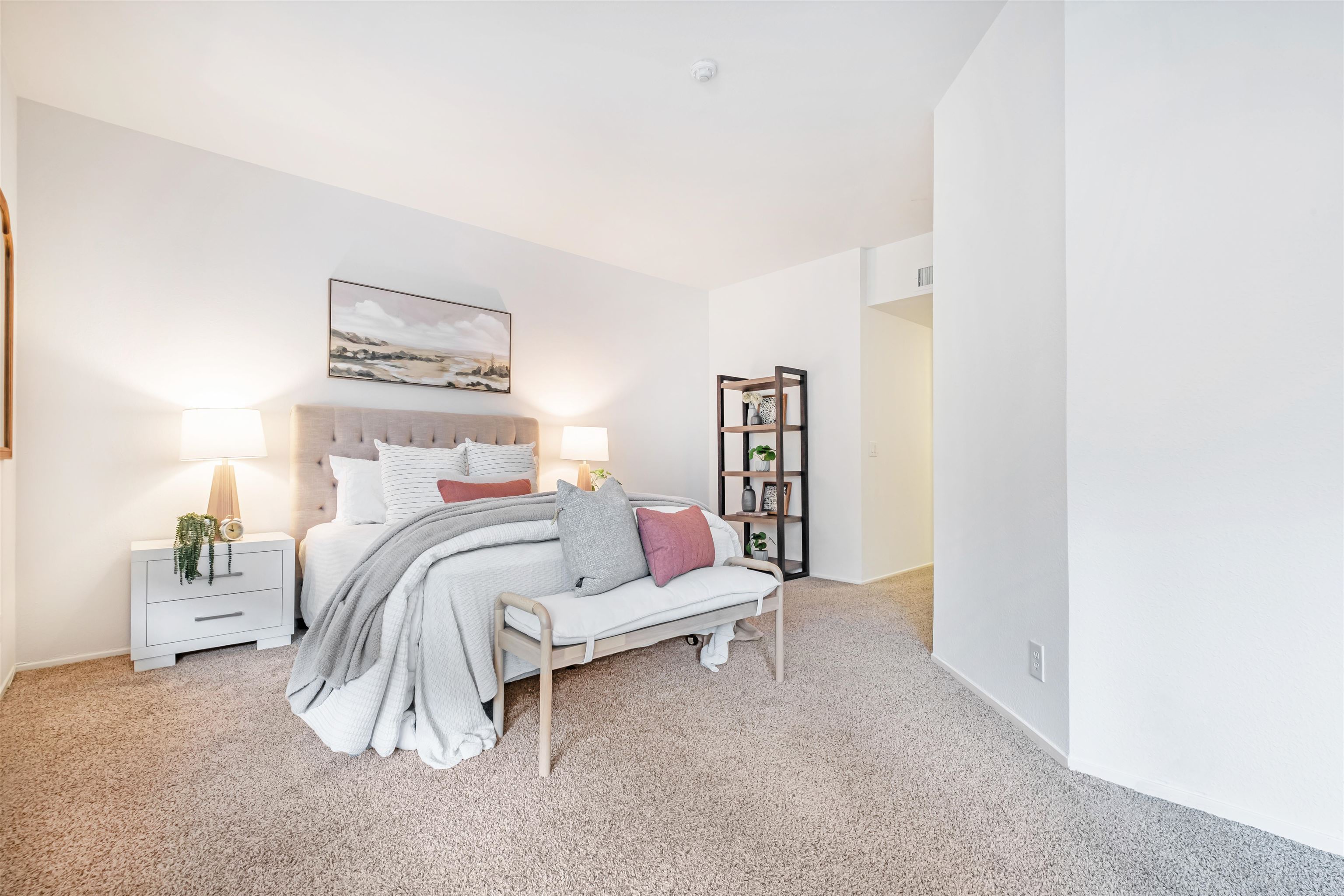 39945 Parada Street, Unit A Newark, CA 94560 - Photo 21 of 44 a bedroom with a bed and a wall painting