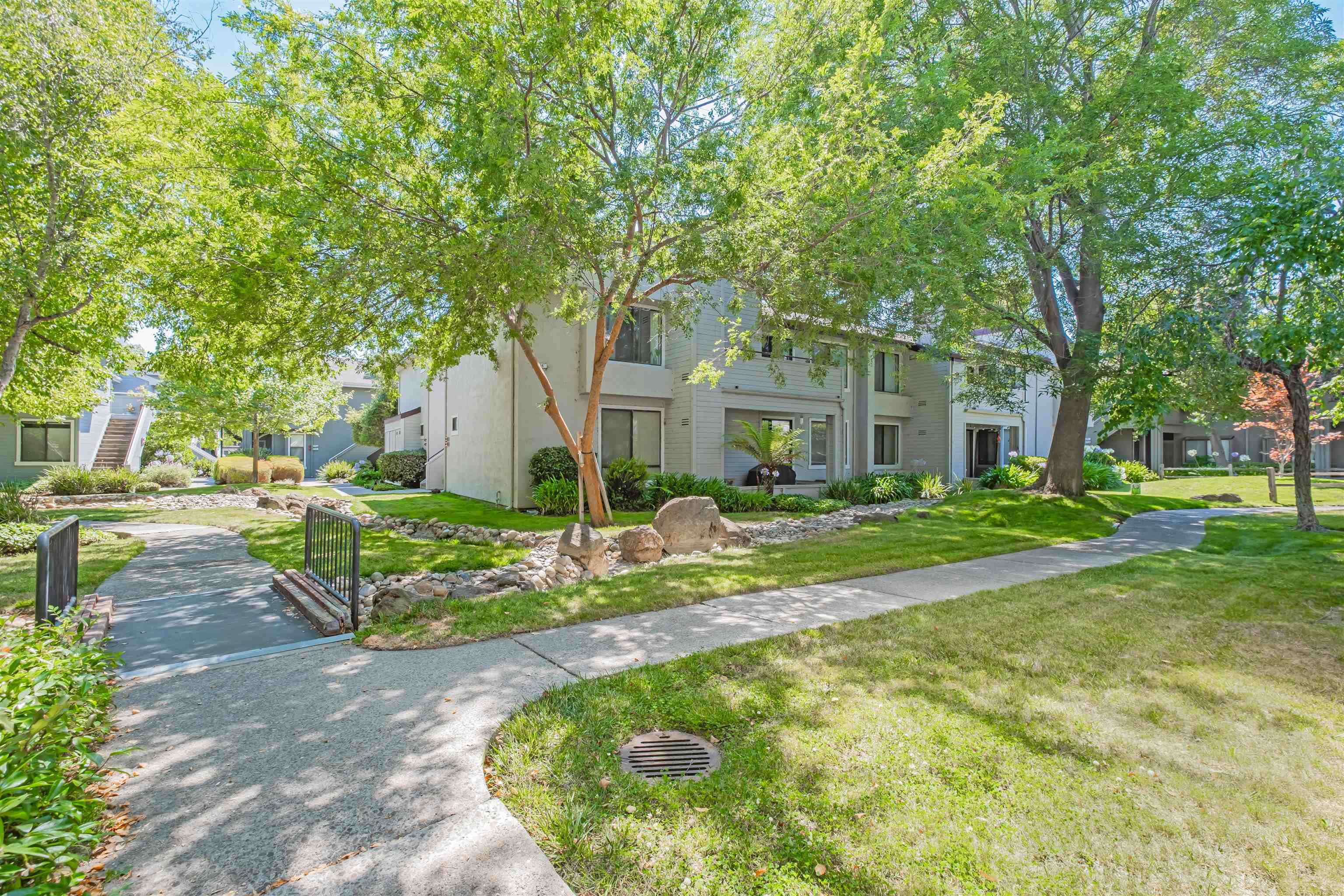 39945 Parada Street, Unit A Newark, CA 94560 - Photo 39 of 44 a view of house with backyard and garden