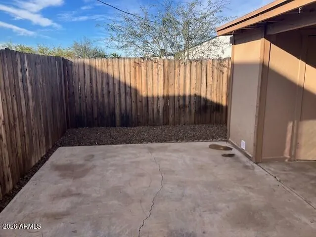 a view of backyard with green space