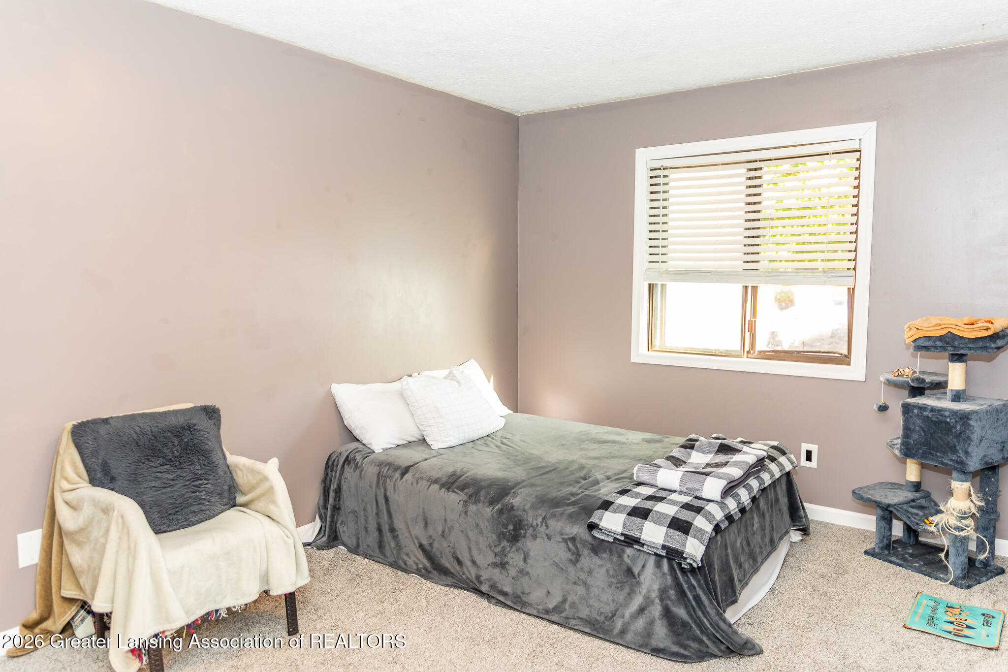 101 East Jolly Road, Unit B8 24 Lansing, MI 48910 - Photo 15 of 43 Primary Bedroom