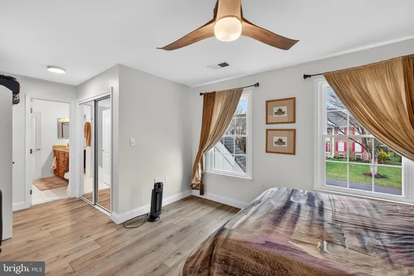 a room with furniture and wooden floor