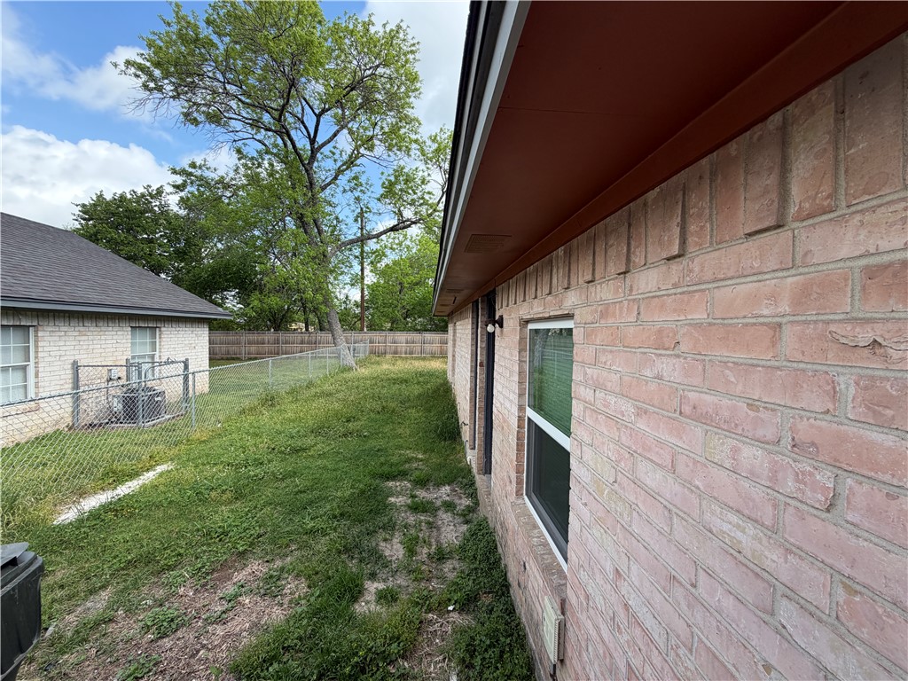 306 West 23rd Street Bryan, TX 77803 - Photo 11 of 12 a view of backyard of house with wooden floor