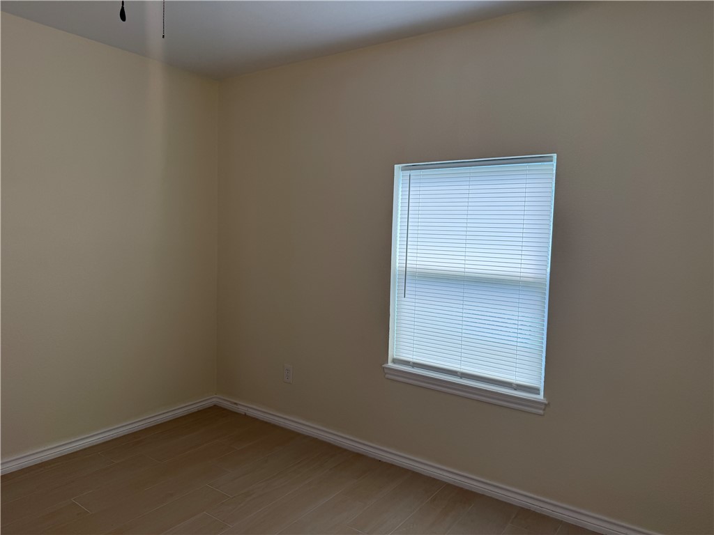 306 West 23rd Street Bryan, TX 77803 - Photo 2 of 12 a small space with a window