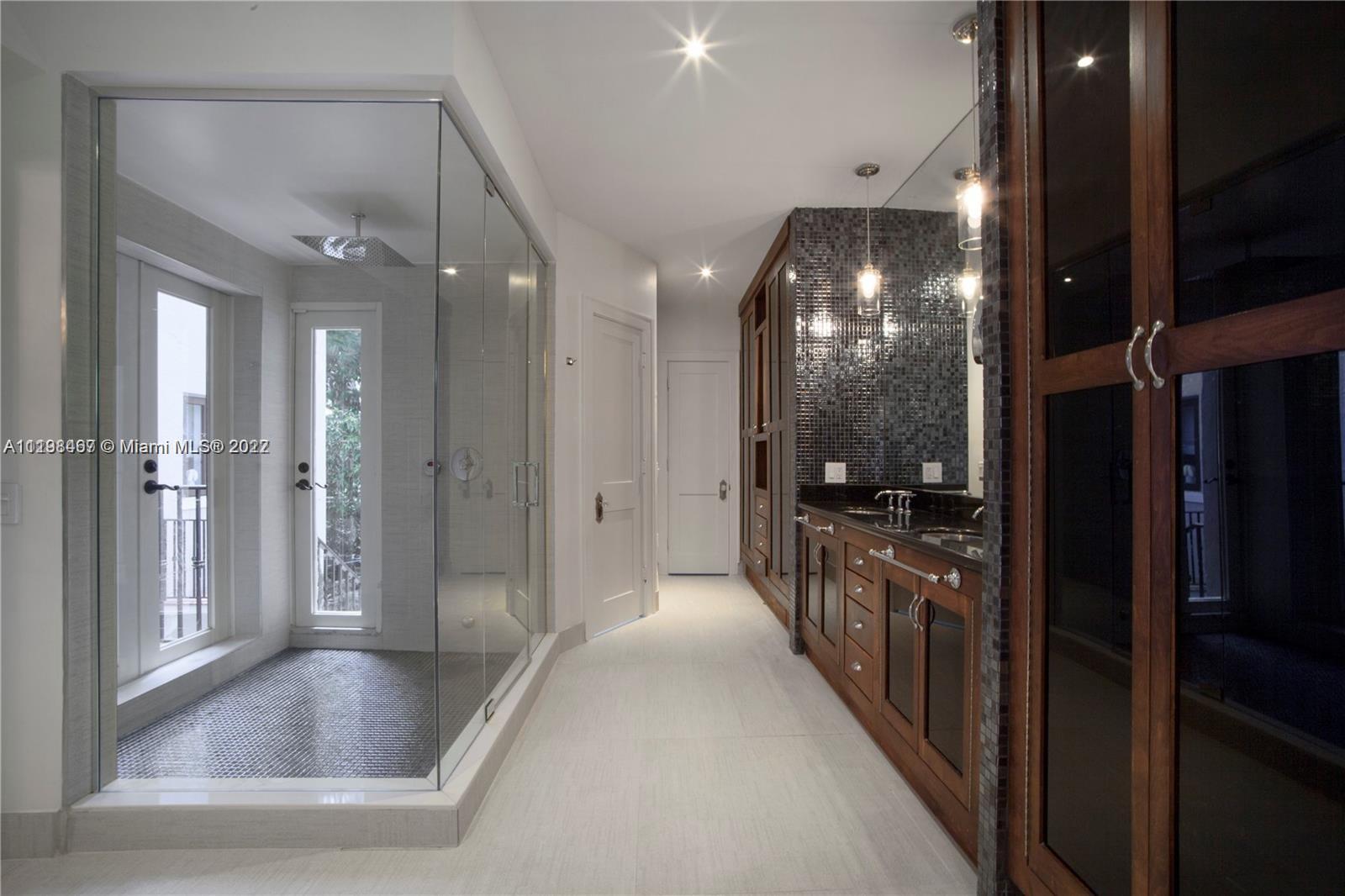 5768 Pine Tree Drive Miami Beach, FL 33140 - Photo 13 of 17 a view of a hallway