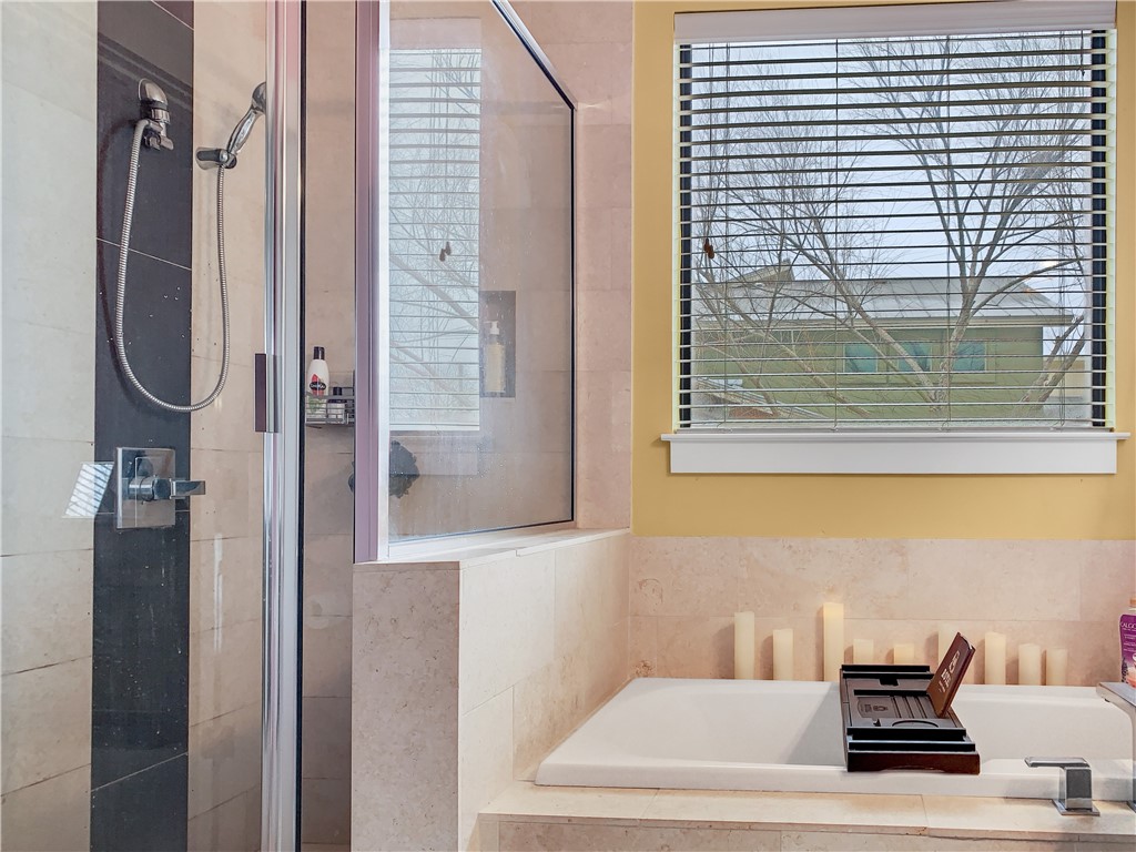 4120 Valley View Road, Unit A Austin, TX 78704 - Photo 11 of 18 Primary bathroom ensuite with separate shower and tub