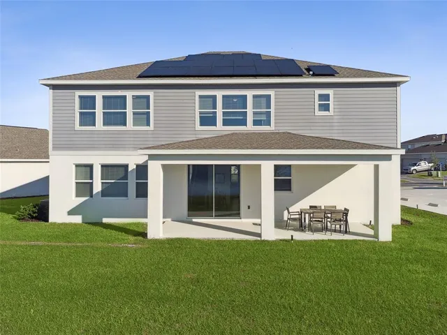 a picture of a room with a white wall and white picture