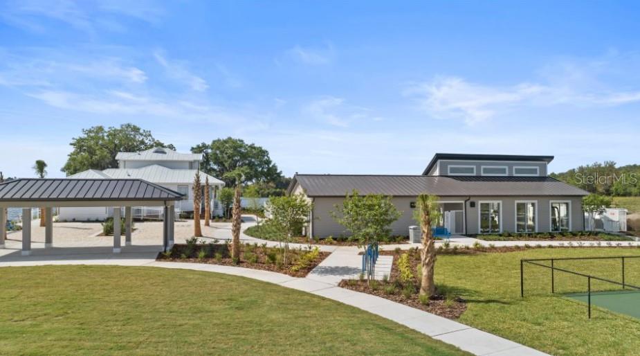 3012 Ella Way St. Cloud, FL 34771 - Photo 34 of 56 a view of house with swimming pool and outdoor seating