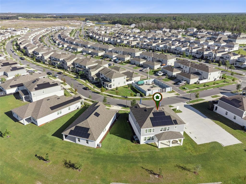 3012 Ella Way St. Cloud, FL 34771 - Photo 4 of 56 an aerial view of residential houses with outdoor space