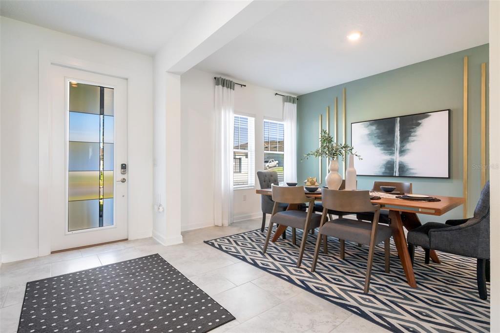 3012 Ella Way St. Cloud, FL 34771 - Photo 5 of 56 a living room with furniture a rug and a window