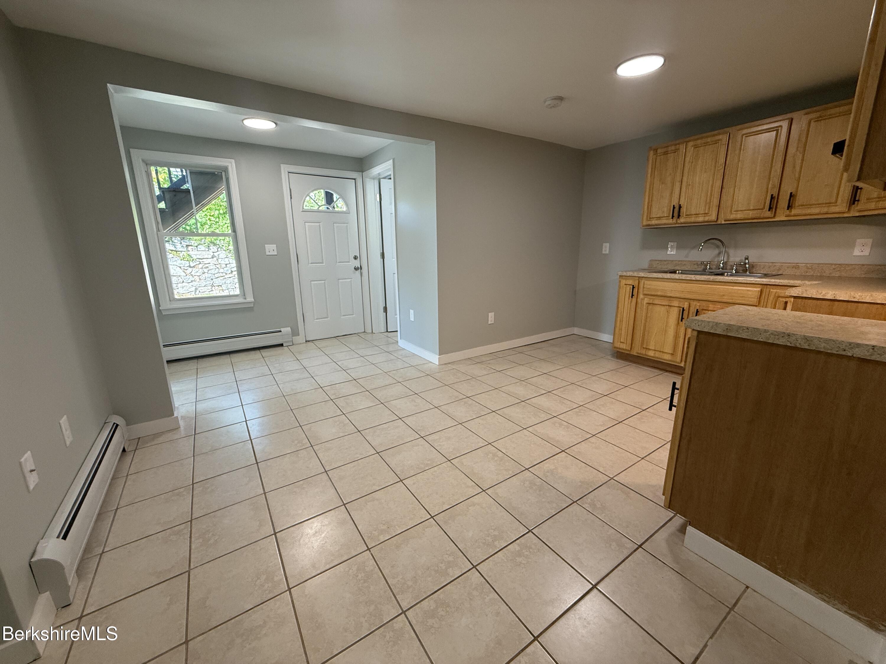 17 Elm Street, Unit A Adams, MA 01220 - Photo 5 of 17 a view of kitchen with windows