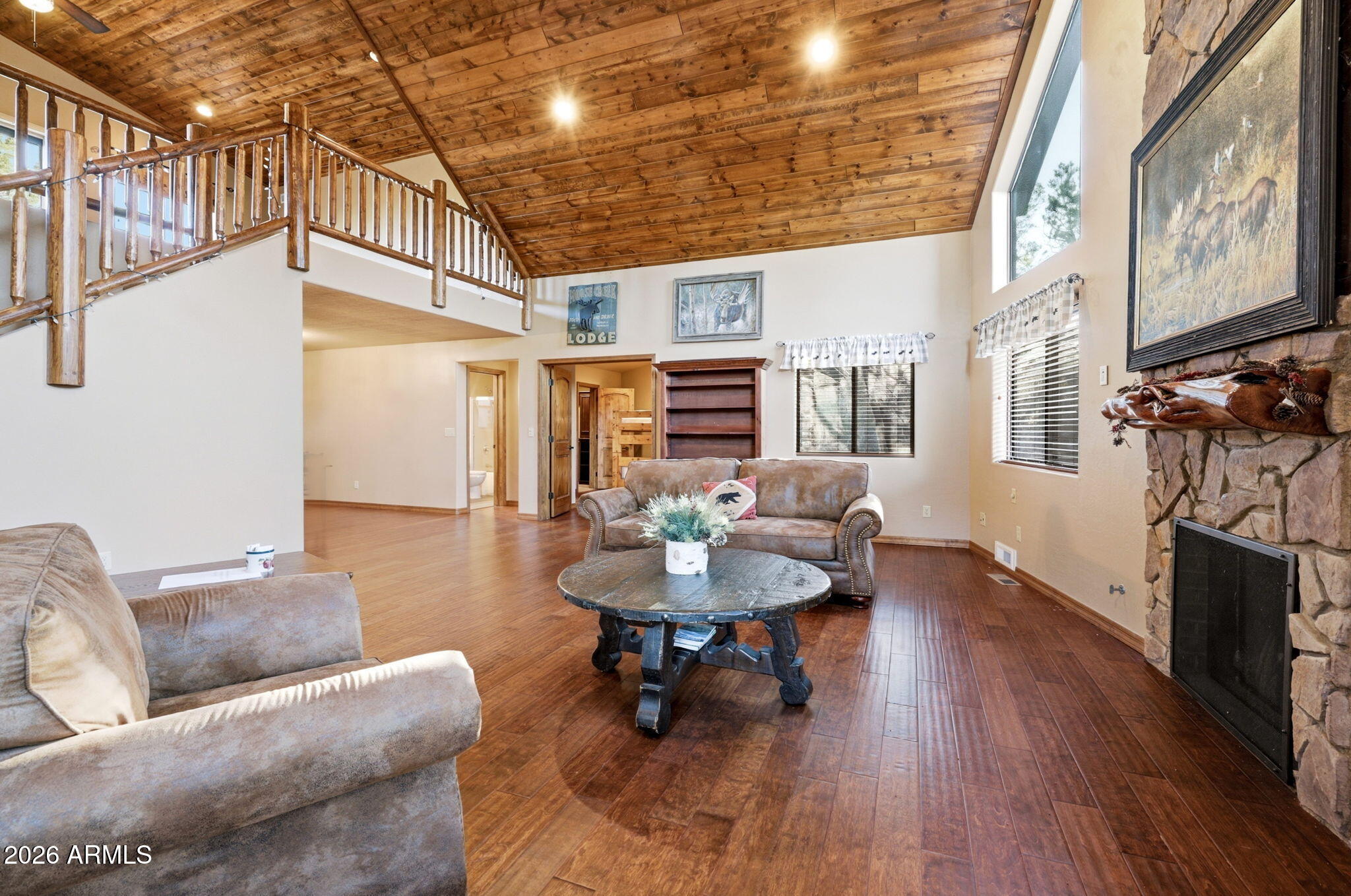 2750 Columbia Lane Overgaard, AZ 85933 - Photo 13 of 51 a living room with furniture and a fireplace