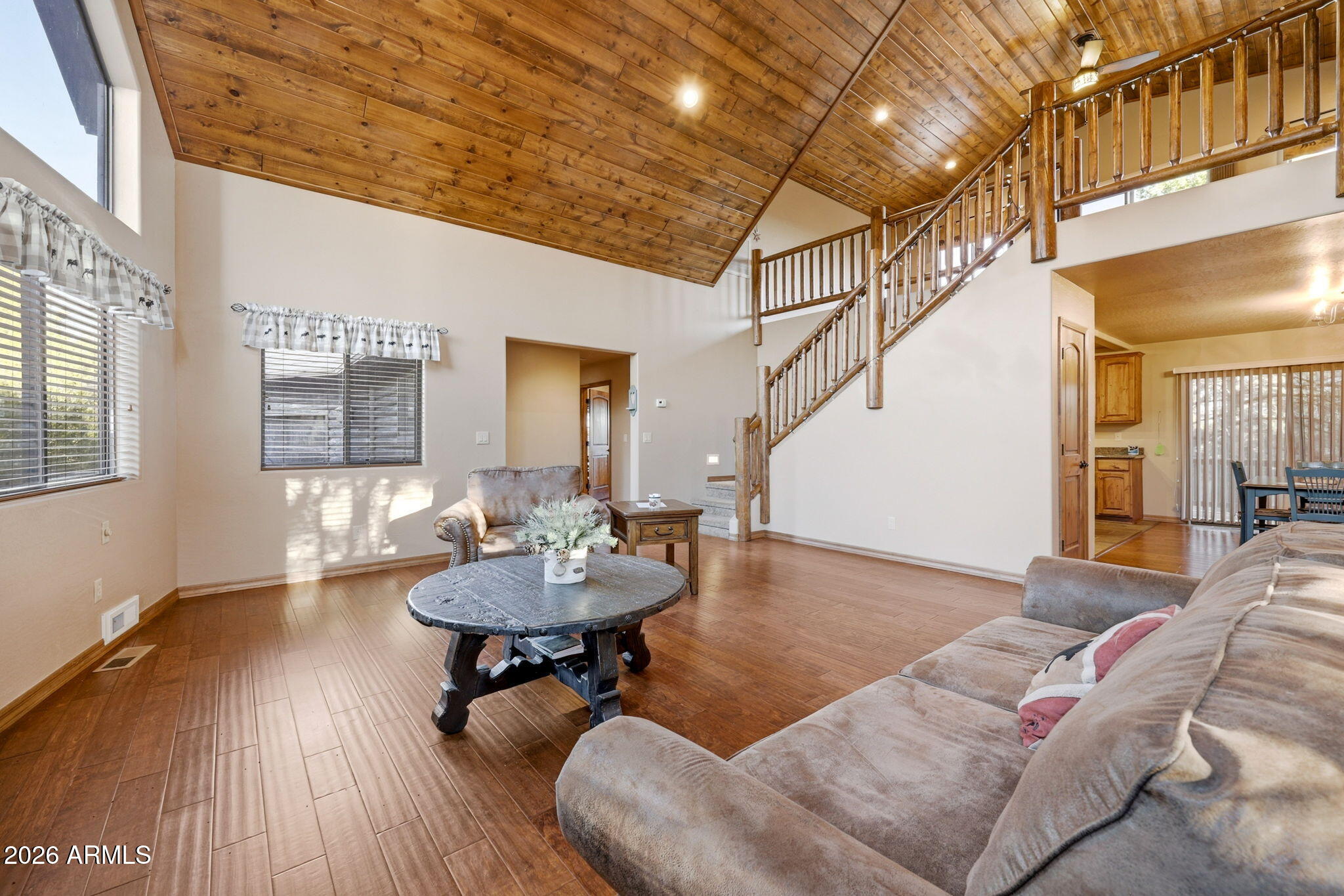 2750 Columbia Lane Overgaard, AZ 85933 - Photo 14 of 51 a living room with furniture and a table