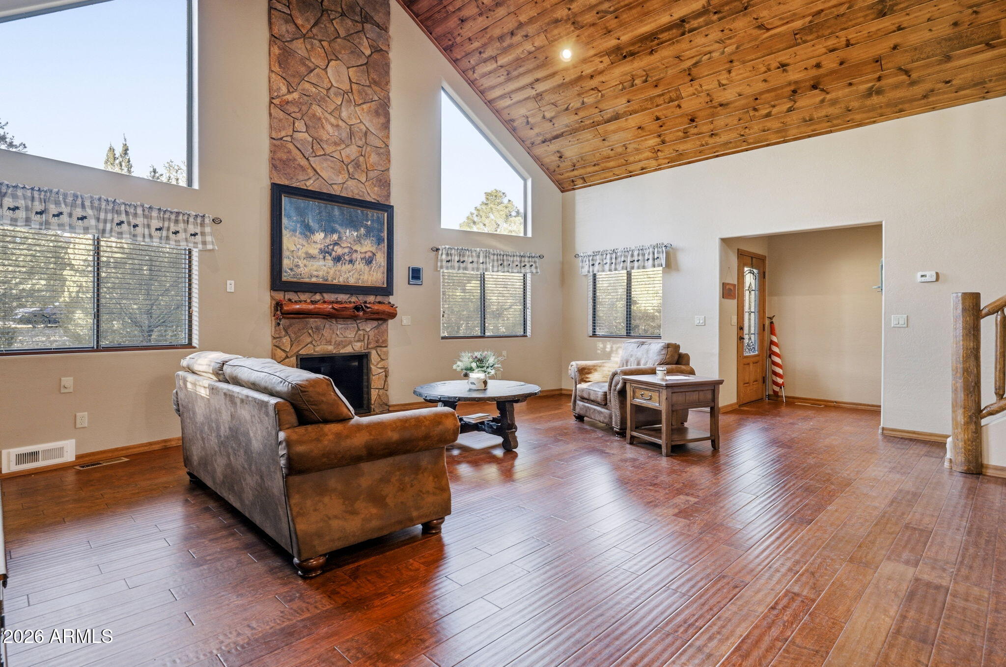 2750 Columbia Lane Overgaard, AZ 85933 - Photo 15 of 51 a living room with furniture and a fireplace