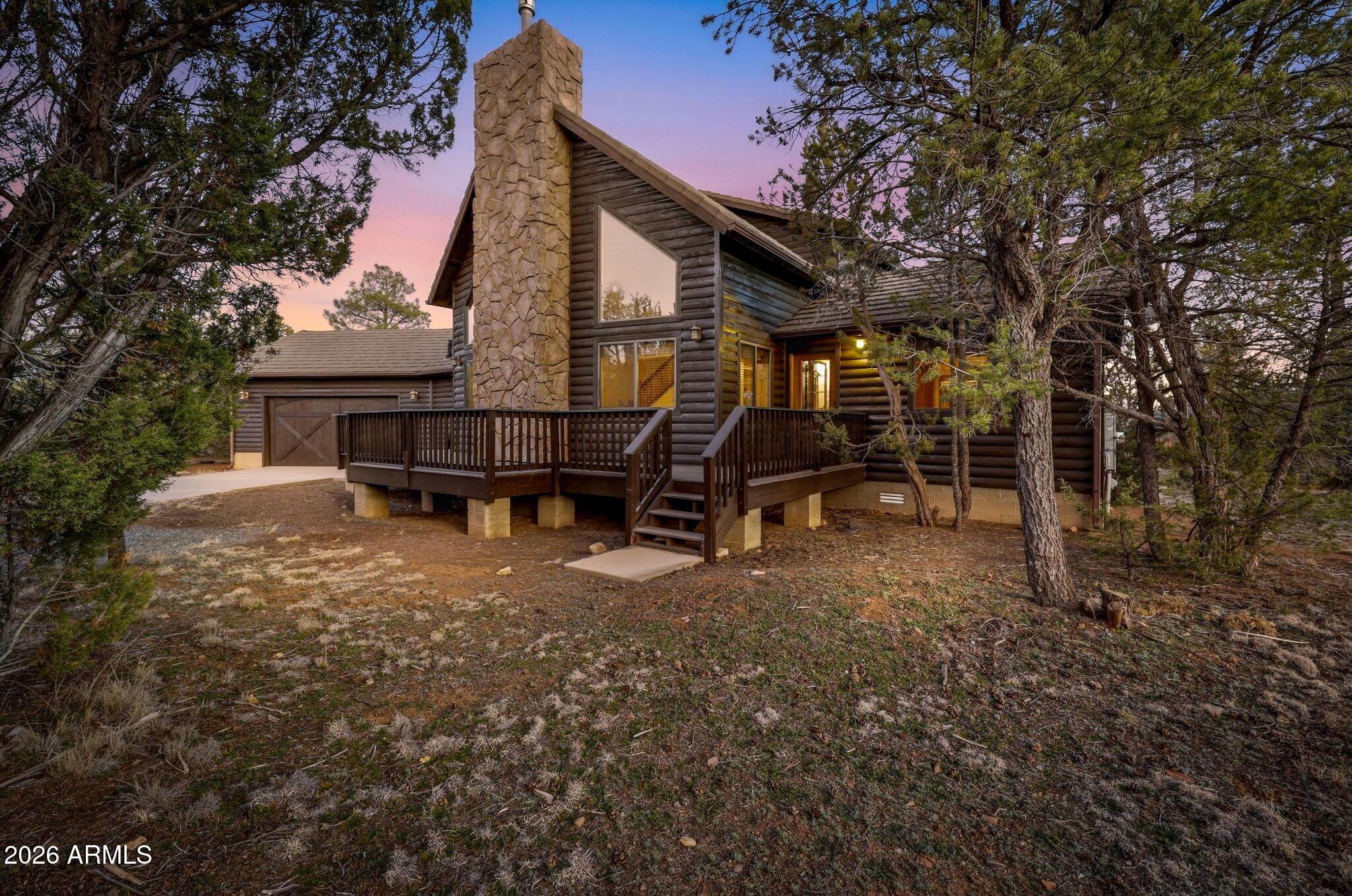 2750 Columbia Lane Overgaard, AZ 85933 - Photo 2 of 51 a view of a house with a yard and sitting area