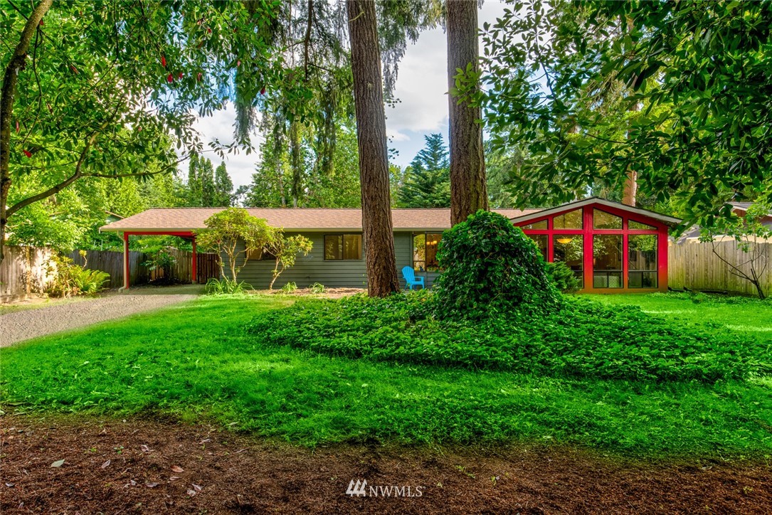 10044 Slater Avenue Northeast Kirkland, WA 98033 - Photo 19 of 21 a front view of a house with yard and green space
