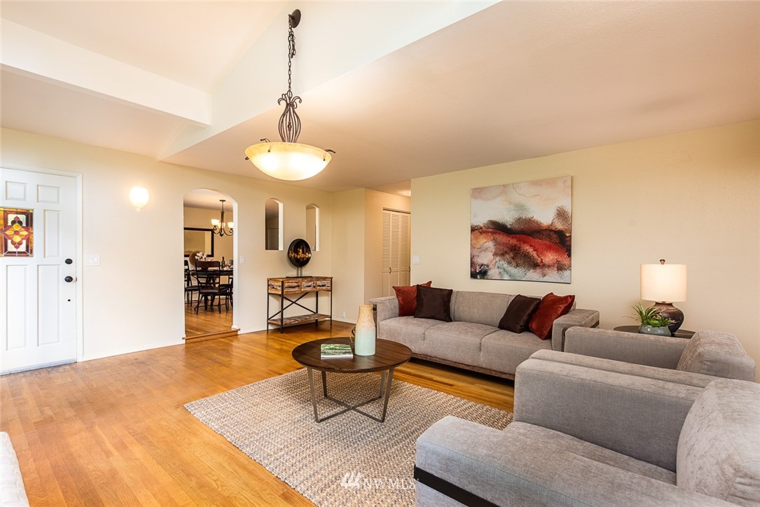 10044 Slater Avenue Northeast Kirkland, WA 98033 - Photo 3 of 21 a living room with furniture and a table