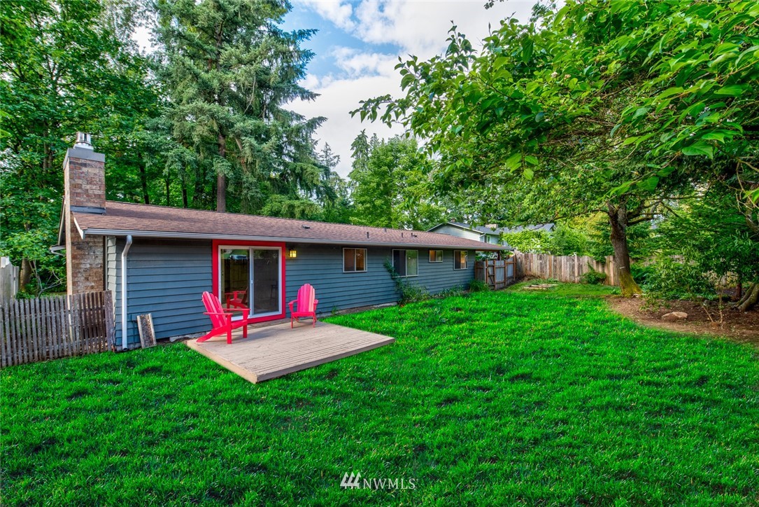 10044 Slater Avenue Northeast Kirkland, WA 98033 - Photo 21 of 21 a front view of house with yard and green space
