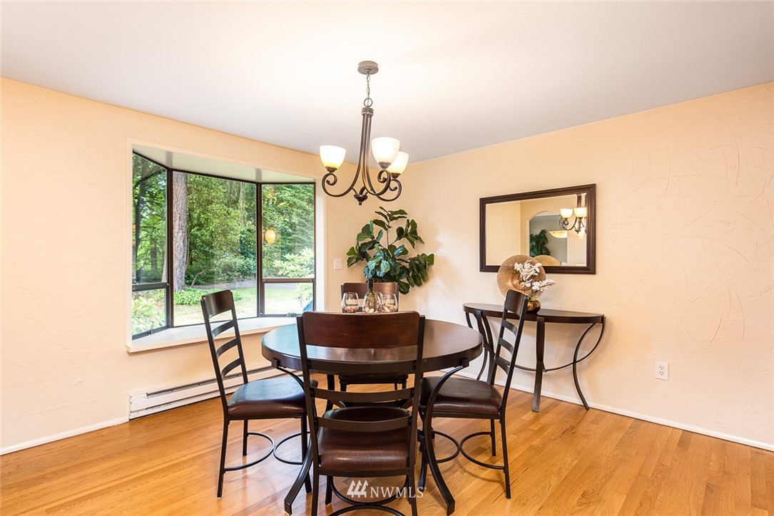 10044 Slater Avenue Northeast Kirkland, WA 98033 - Photo 4 of 21 a dining room with furniture and window