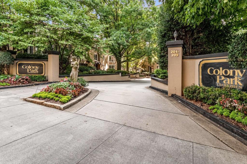 244 13th Street Northeast, Unit 301 Atlanta, GA 30309 - Photo 1 of 1 a view of a street with potted plants