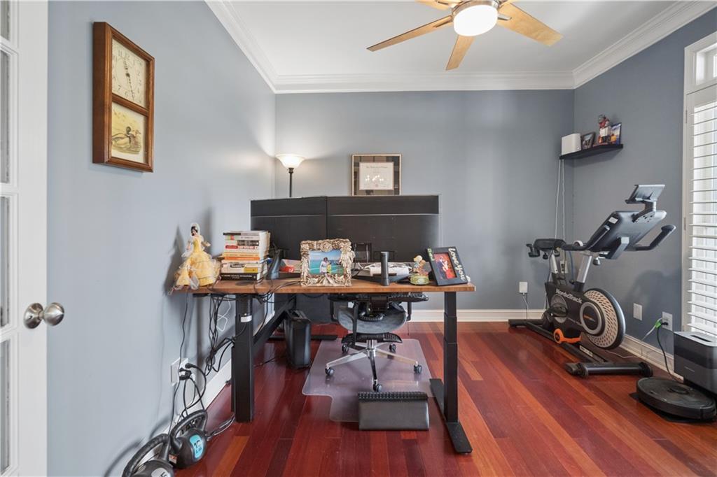 35 Waterstone Drive Southeast Cartersville, GA 30121 - Photo 18 of 58 a view of a workspace with furniture and wooden floor