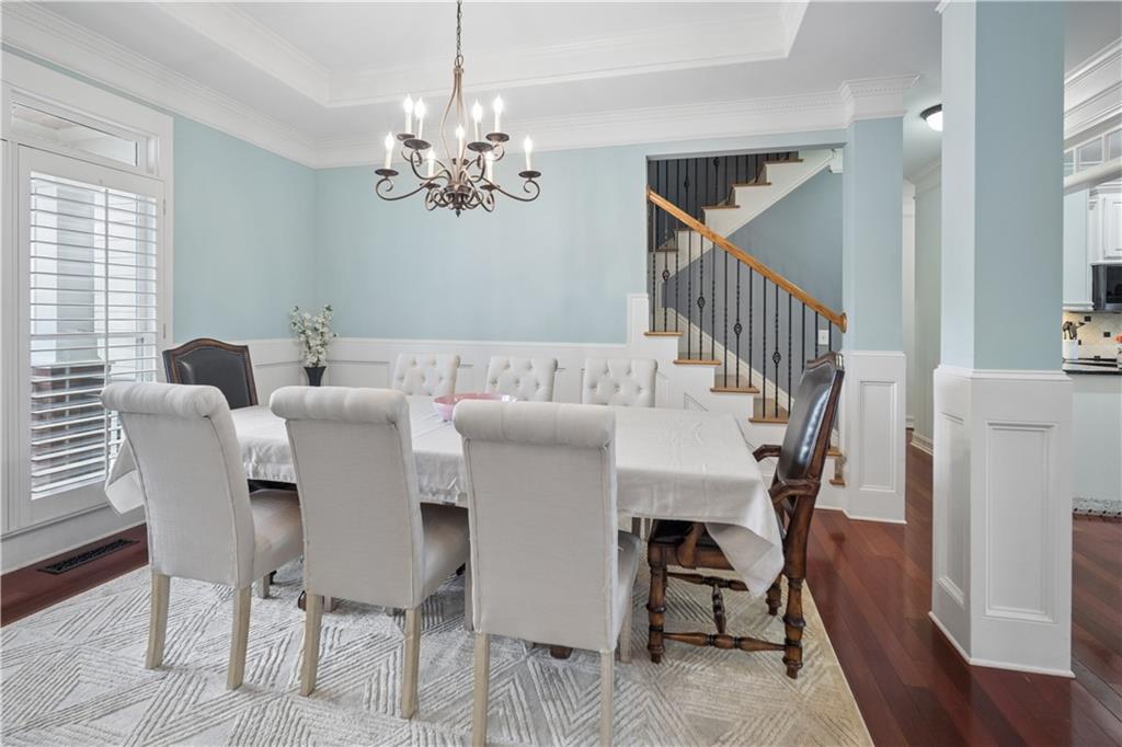 35 Waterstone Drive Southeast Cartersville, GA 30121 - Photo 19 of 58 a view of a dining room with furniture and a chandelier