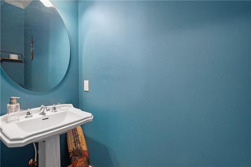 35 Waterstone Drive Southeast Cartersville, GA 30121 - Photo 27 of 58 a bathroom with a sink a mirror and vanity