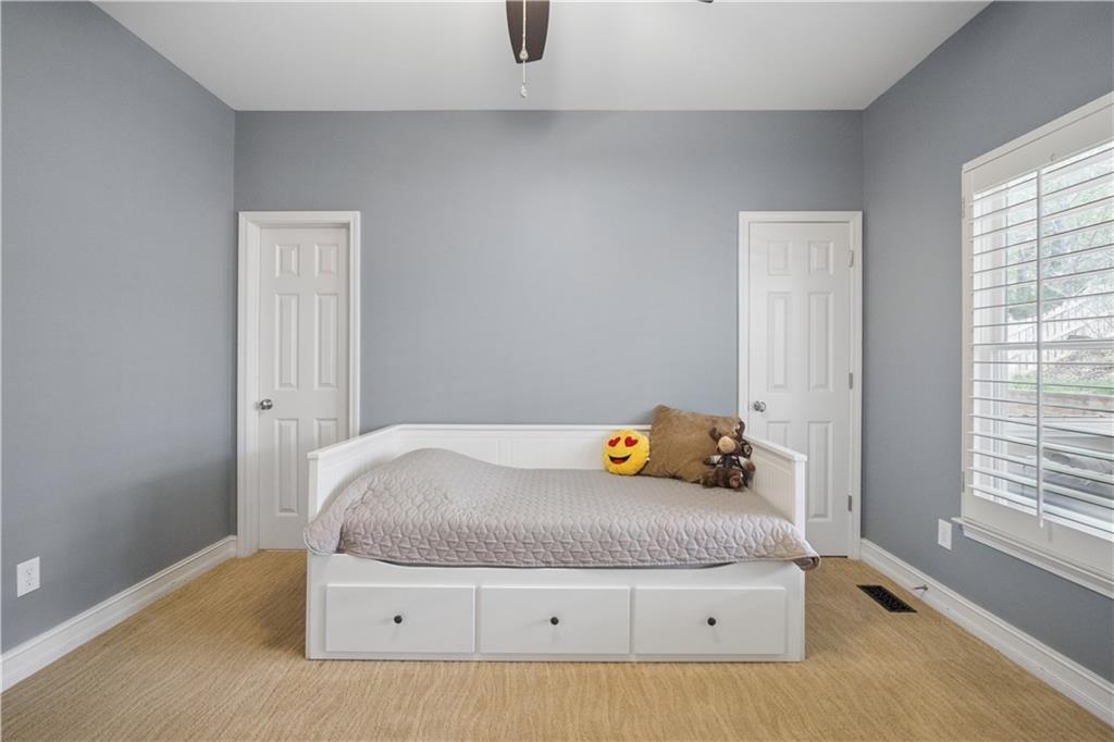 35 Waterstone Drive Southeast Cartersville, GA 30121 - Photo 38 of 58 a bedroom with a bed and window