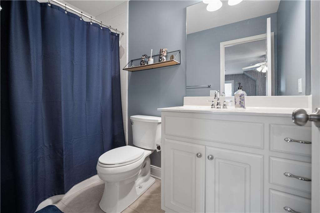 35 Waterstone Drive Southeast Cartersville, GA 30121 - Photo 41 of 58 a bathroom with a sink vanity mirror and toilet
