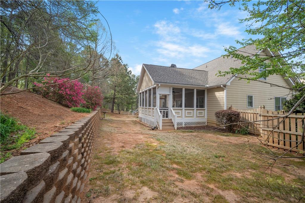 35 Waterstone Drive Southeast Cartersville, GA 30121 - Photo 49 of 58 a view of a house with a yard