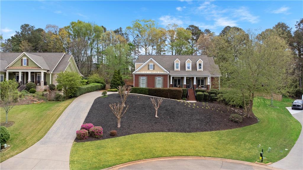 35 Waterstone Drive Southeast Cartersville, GA 30121 - Photo 51 of 58 a front view of a house with a yard