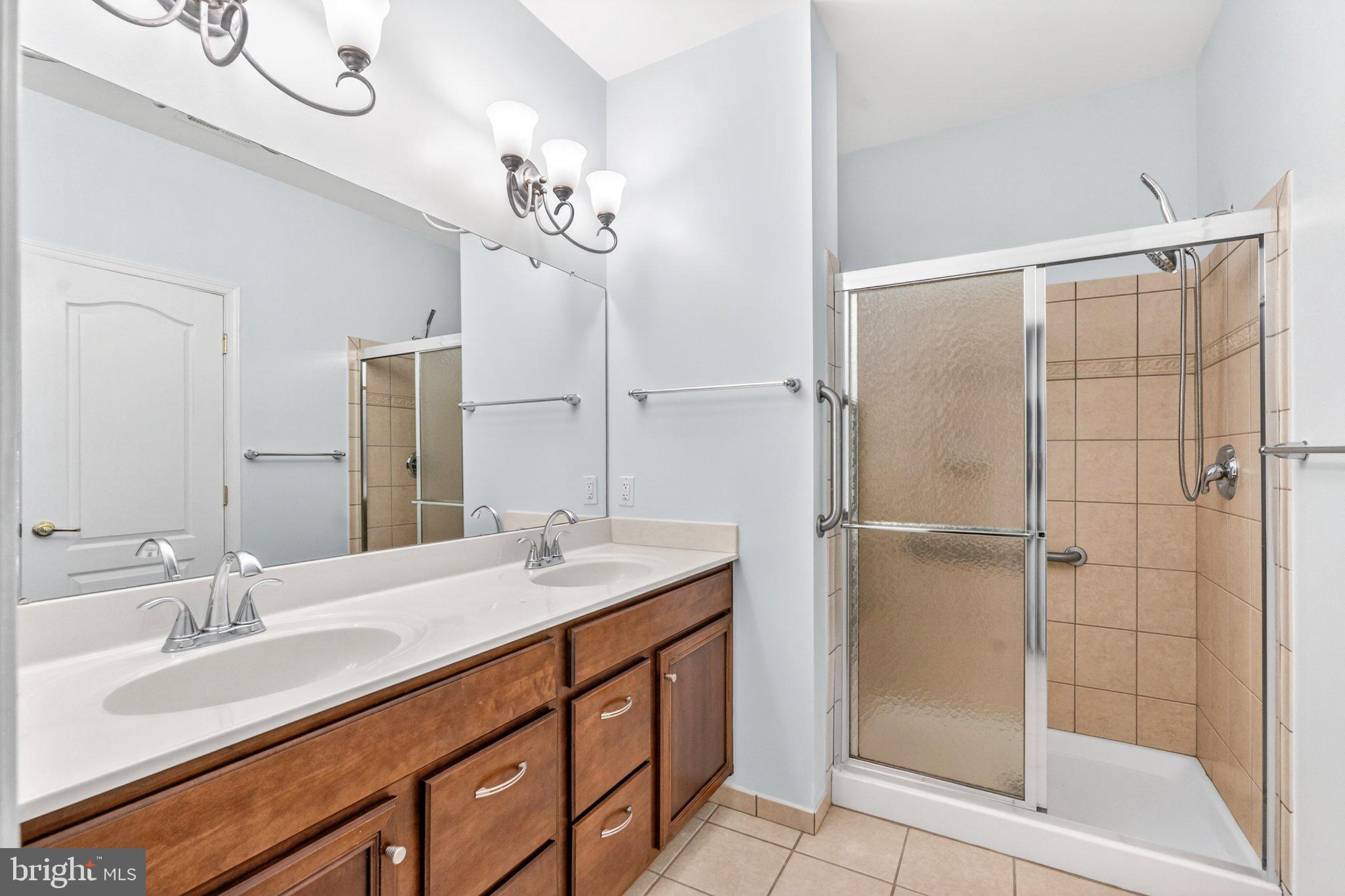 161 Stoyer Road Coatesville, PA 19320 - Photo 26 of 52 Elegant dual-sink bathroom retreat.