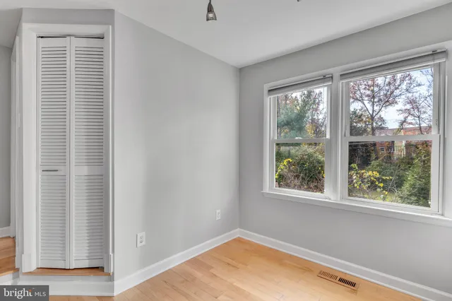 a view of a room with a large window