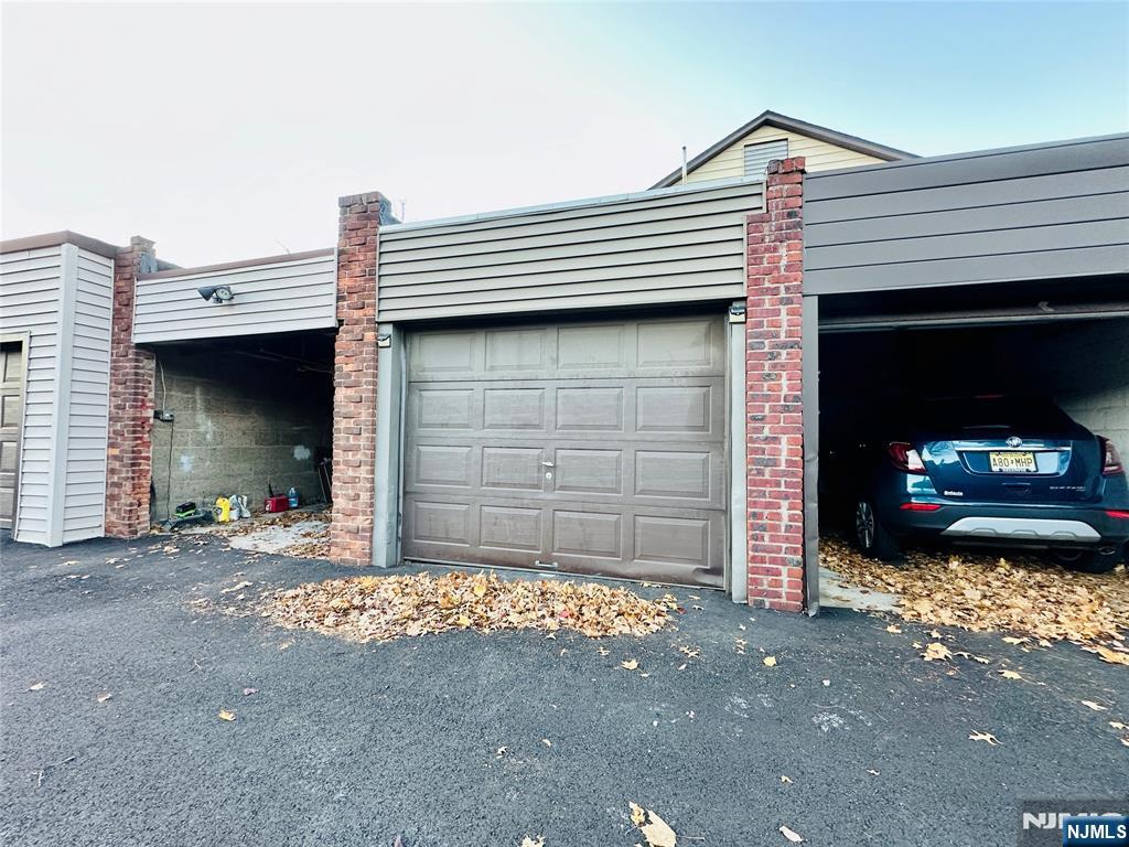 355 Valley Boulevard Wood-Ridge, NJ 07075 - Photo 24 of 24 a front view of a house with a garage