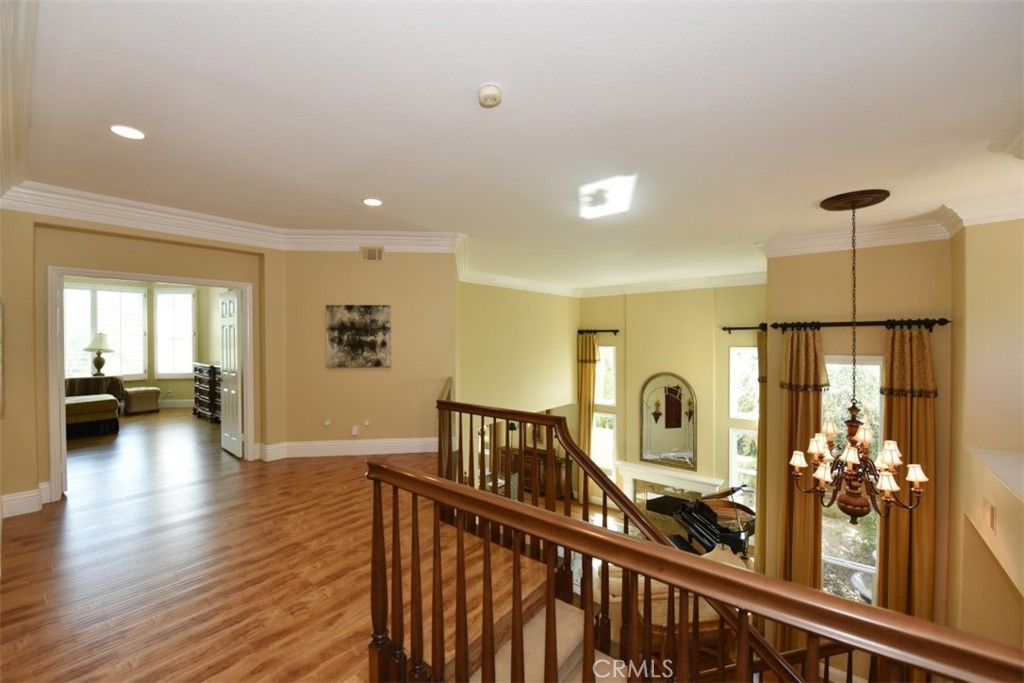 12 Brigadier Irvine, CA 92603 - Photo 44 of 50 a view of a hallway with wooden floor and windows