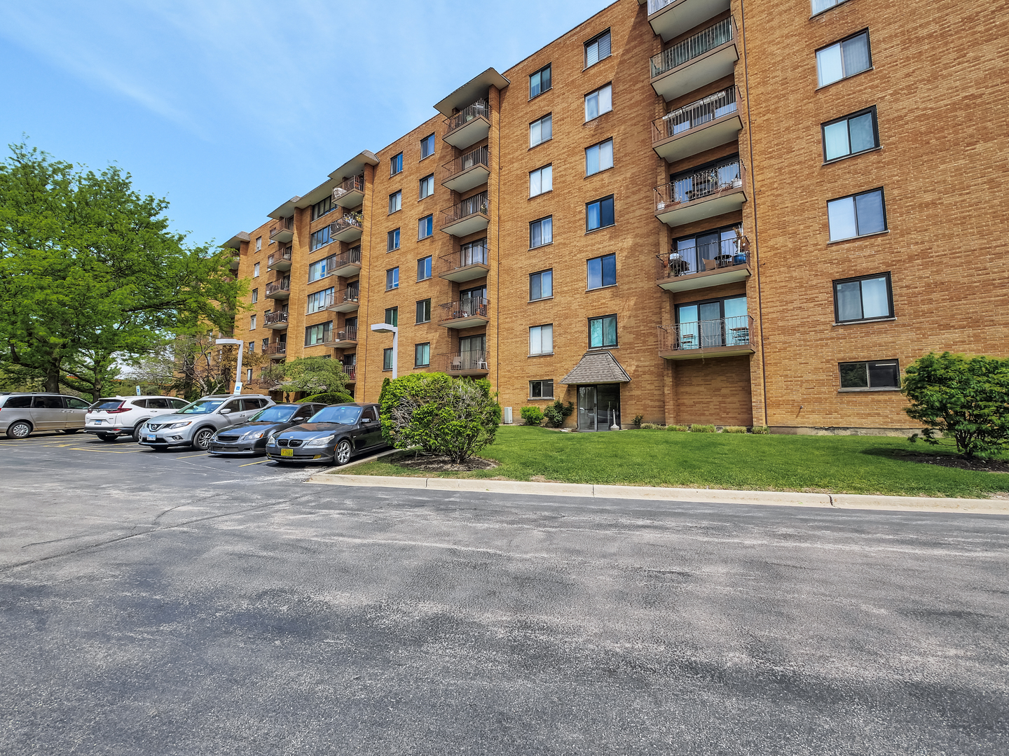 1747 West Crystal Lane, Unit 210 Mount Prospect, IL 60056 - Photo 2 of 33 a view of a building with a street