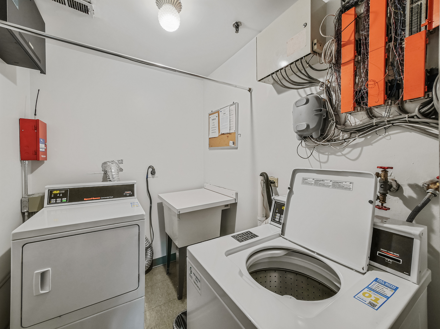 1747 West Crystal Lane, Unit 210 Mount Prospect, IL 60056 - Photo 24 of 33 a utility room with dryer and washer